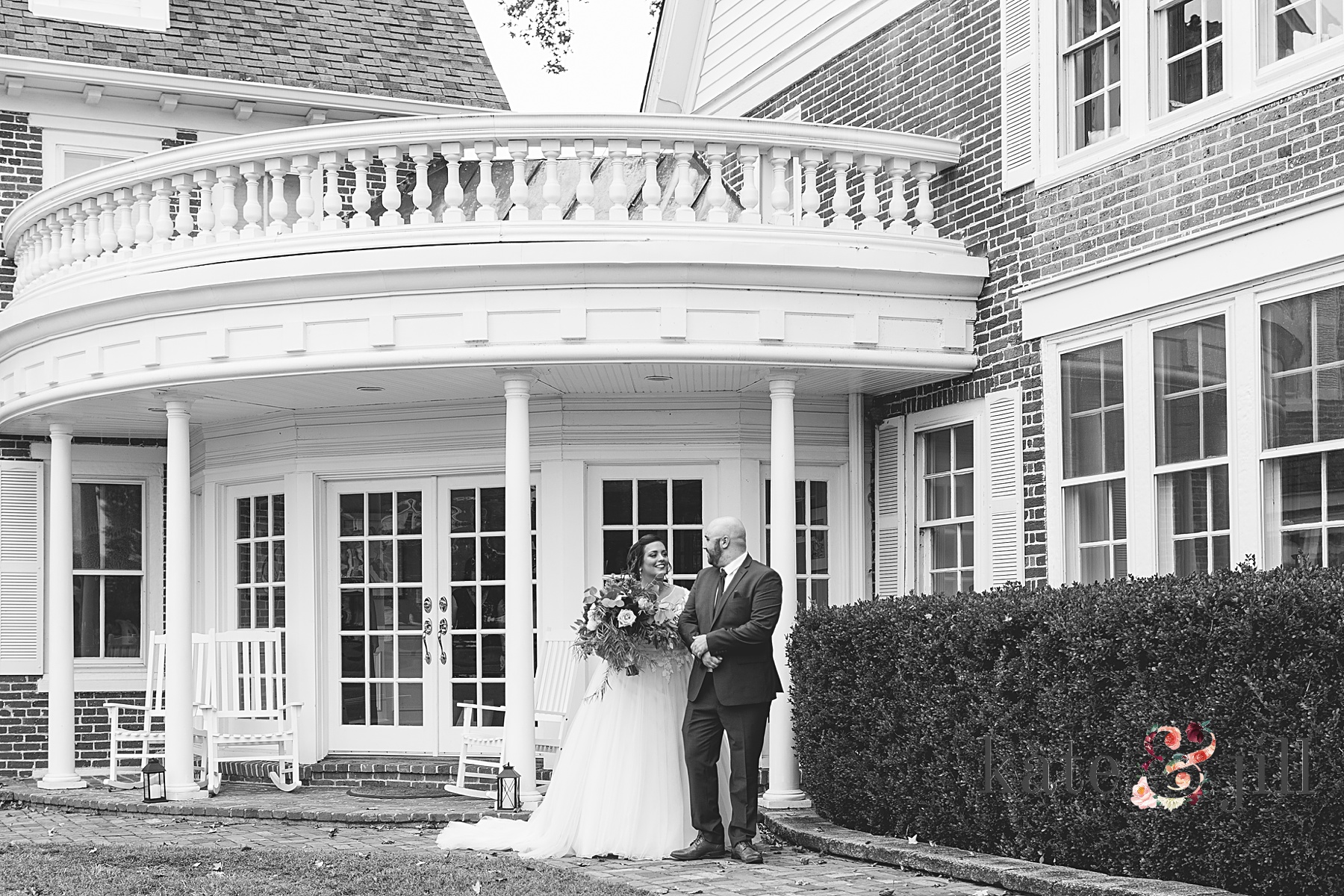 bride and groom first look in front of mansion