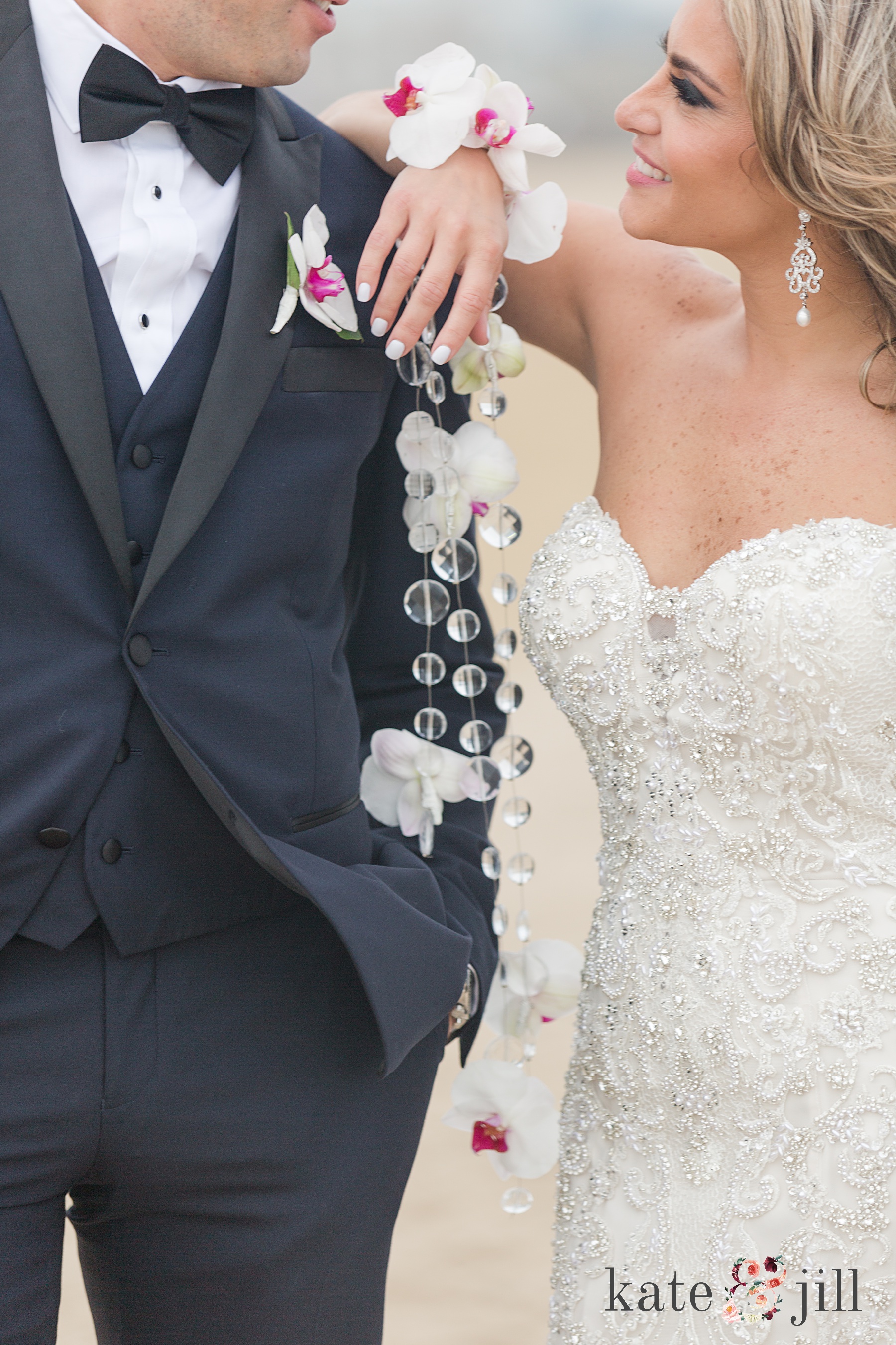 bride and groom hanging floral and rhinestone bouquet mcloone's pier house long branch