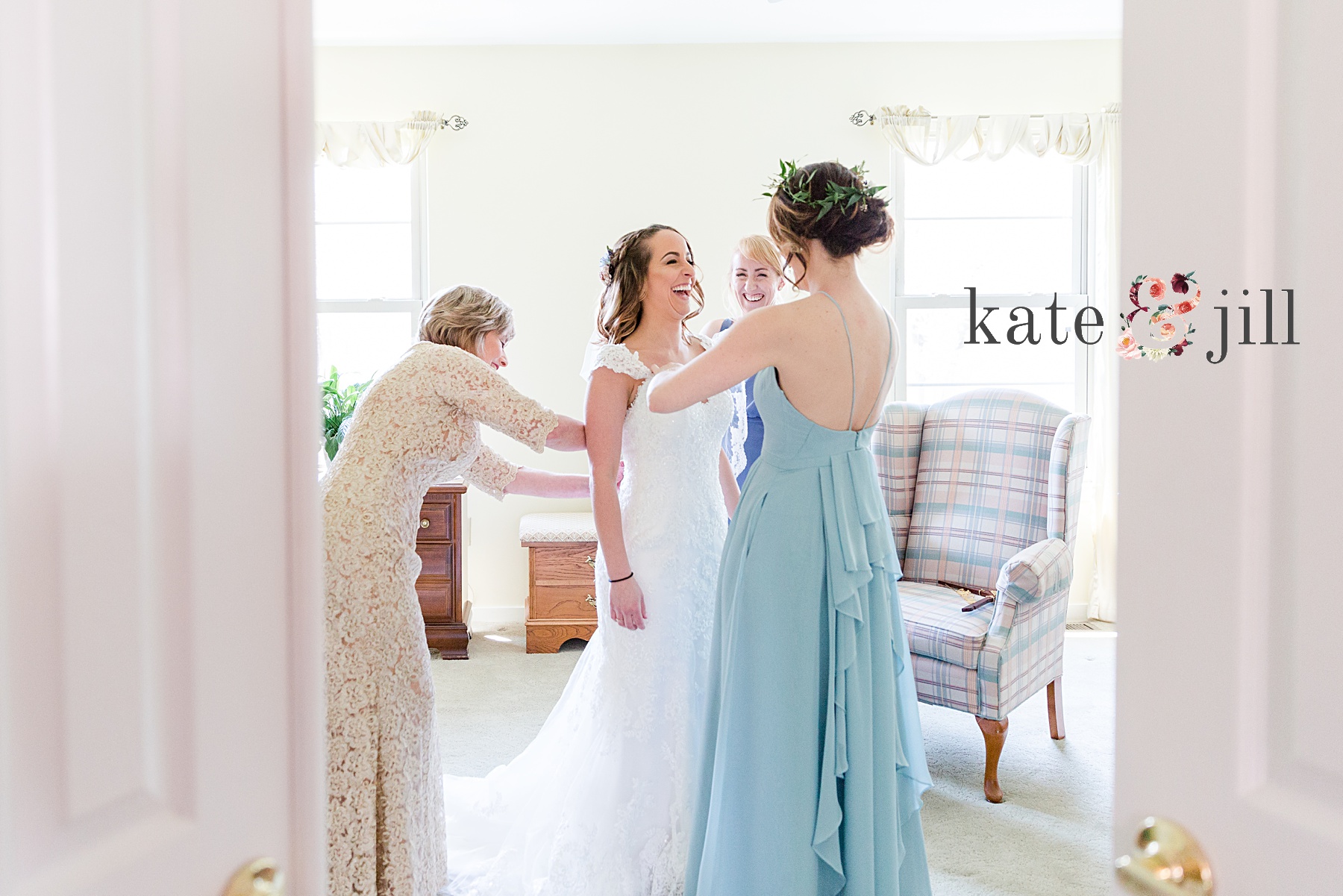 bride getting ready with maids of honor and mom woodcrest country club wedding