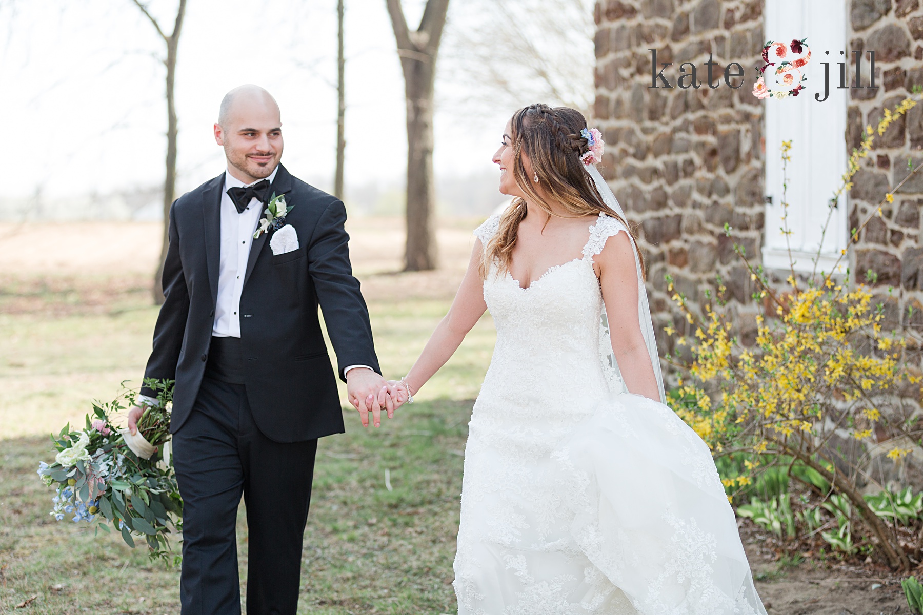 bride and groom holding hands walking in front of church woodcrest country club wedding