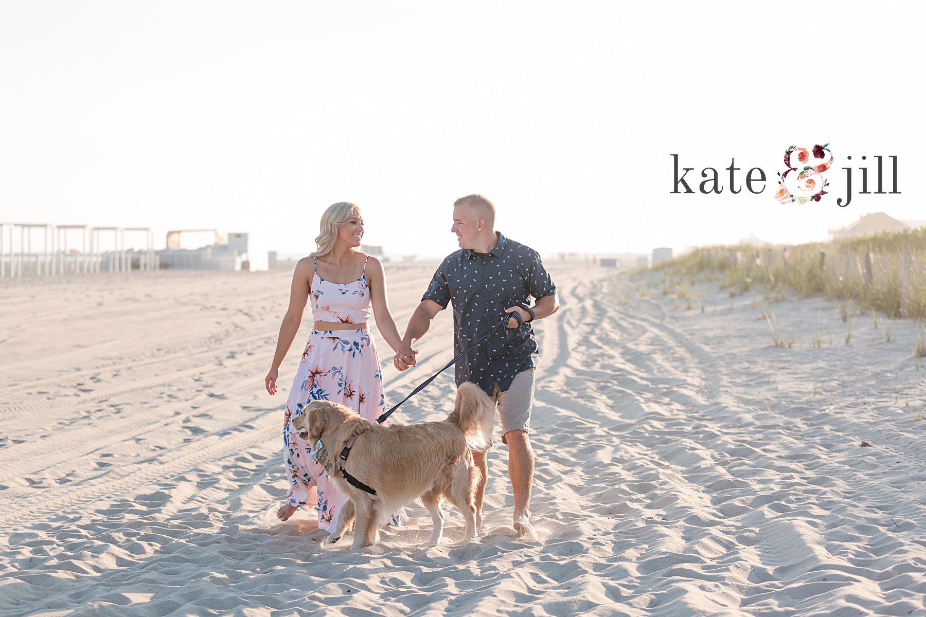 bride and groom walking dog on cape may beach