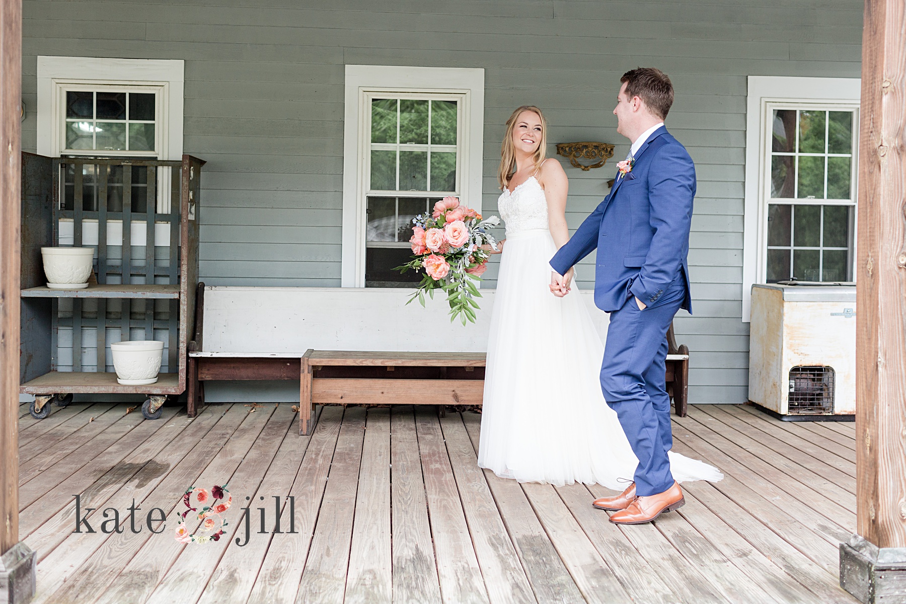 bride and groom walking on porch