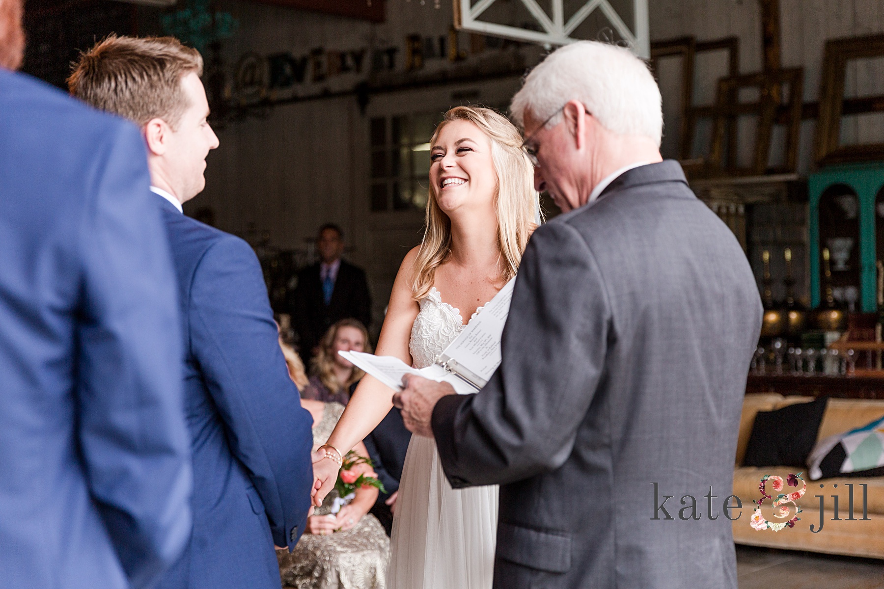 bride laughing during ceremony