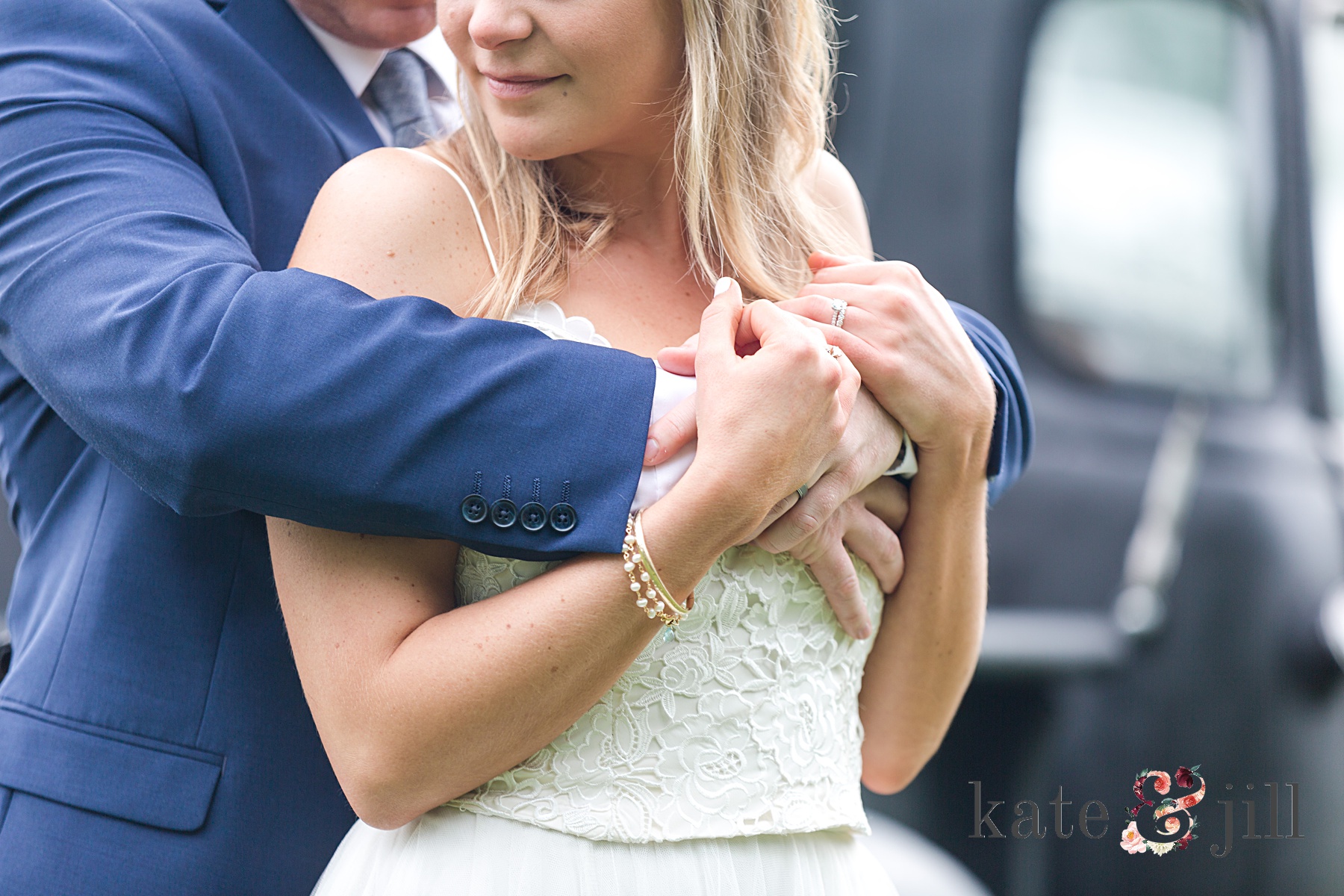 close up photo of bride and grooms hands