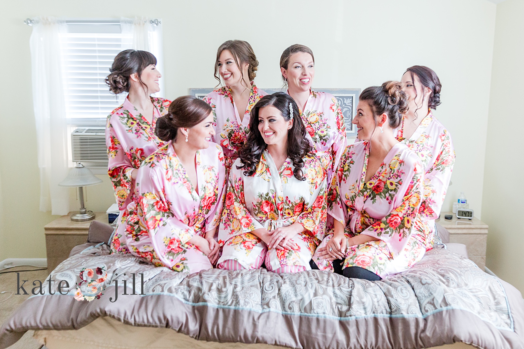 bride and bridesmaids in matching robes