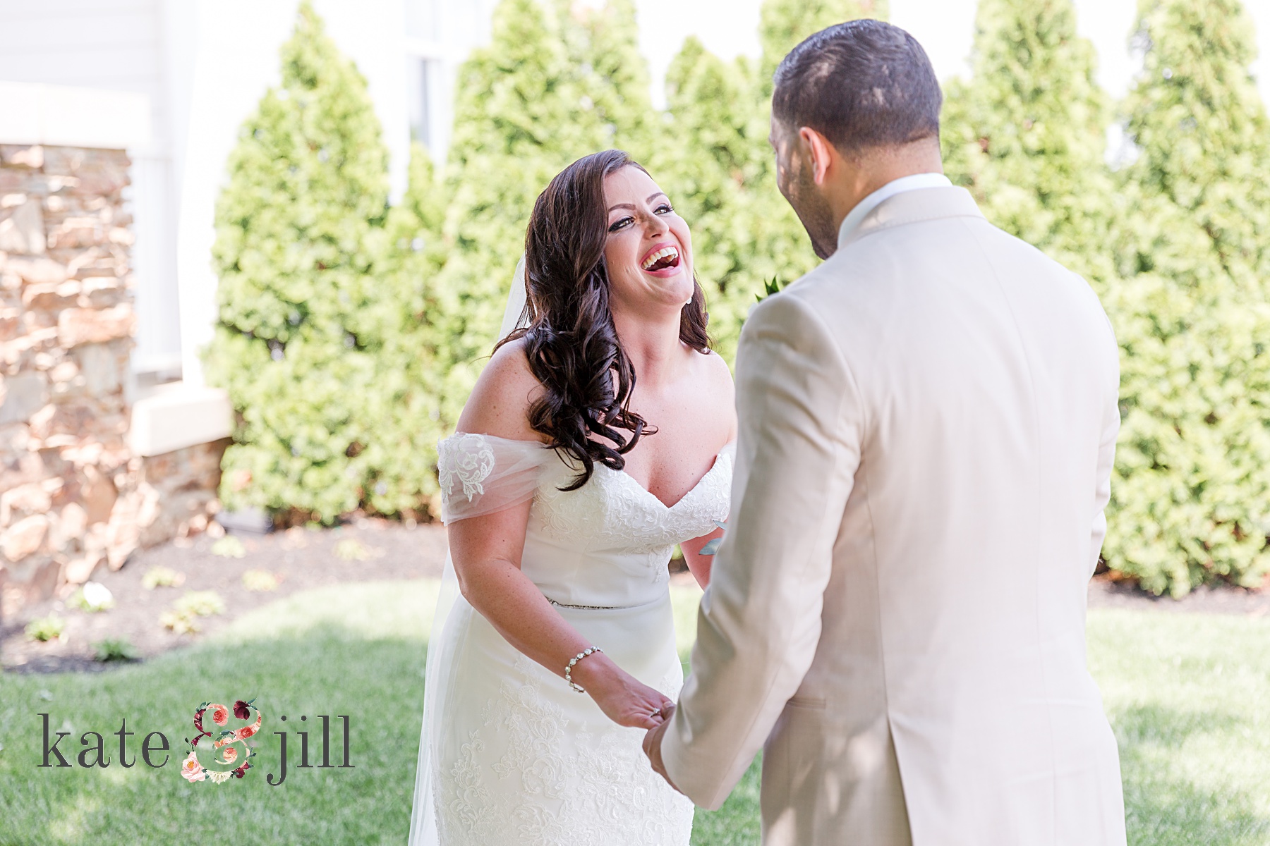 bride laughing after seeing groom for first time
