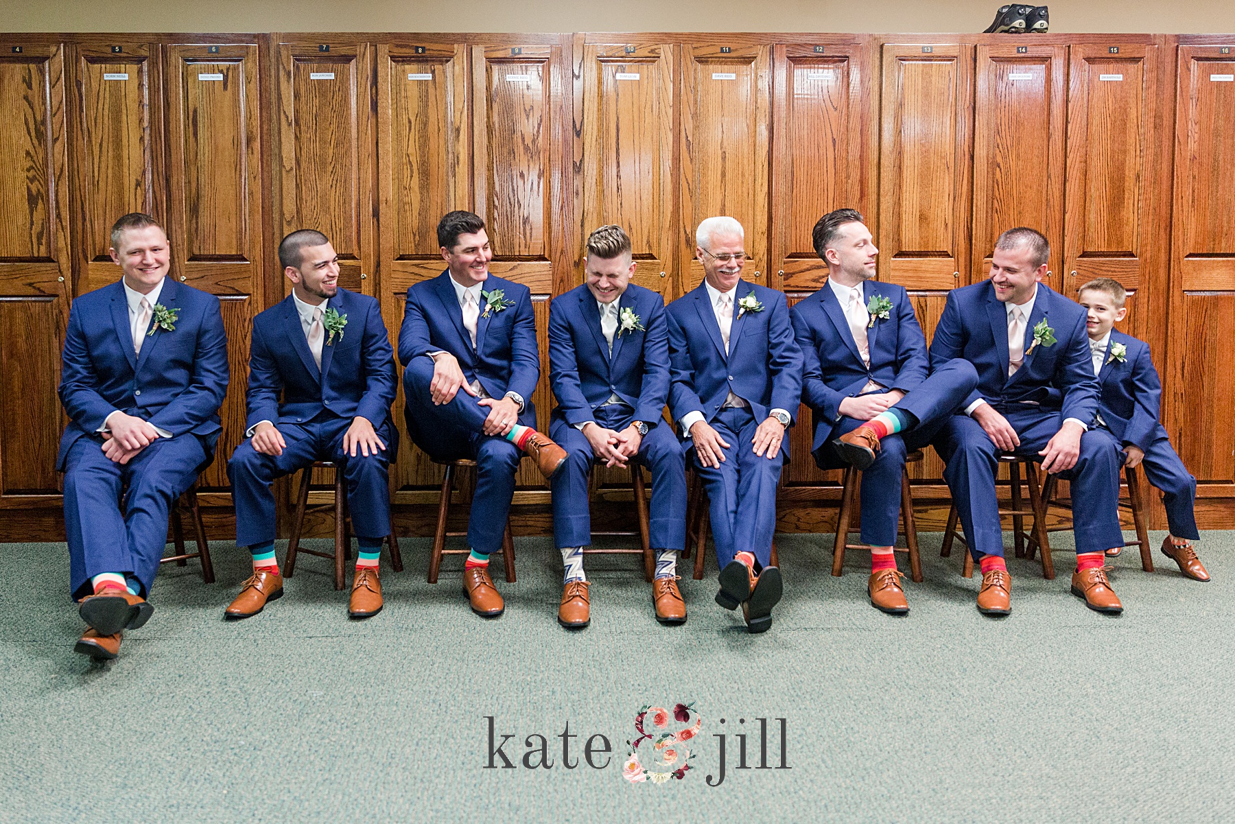 groomsmen and groom while getting ready