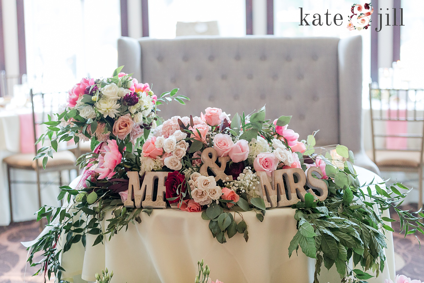 sweetheart table filled with florals