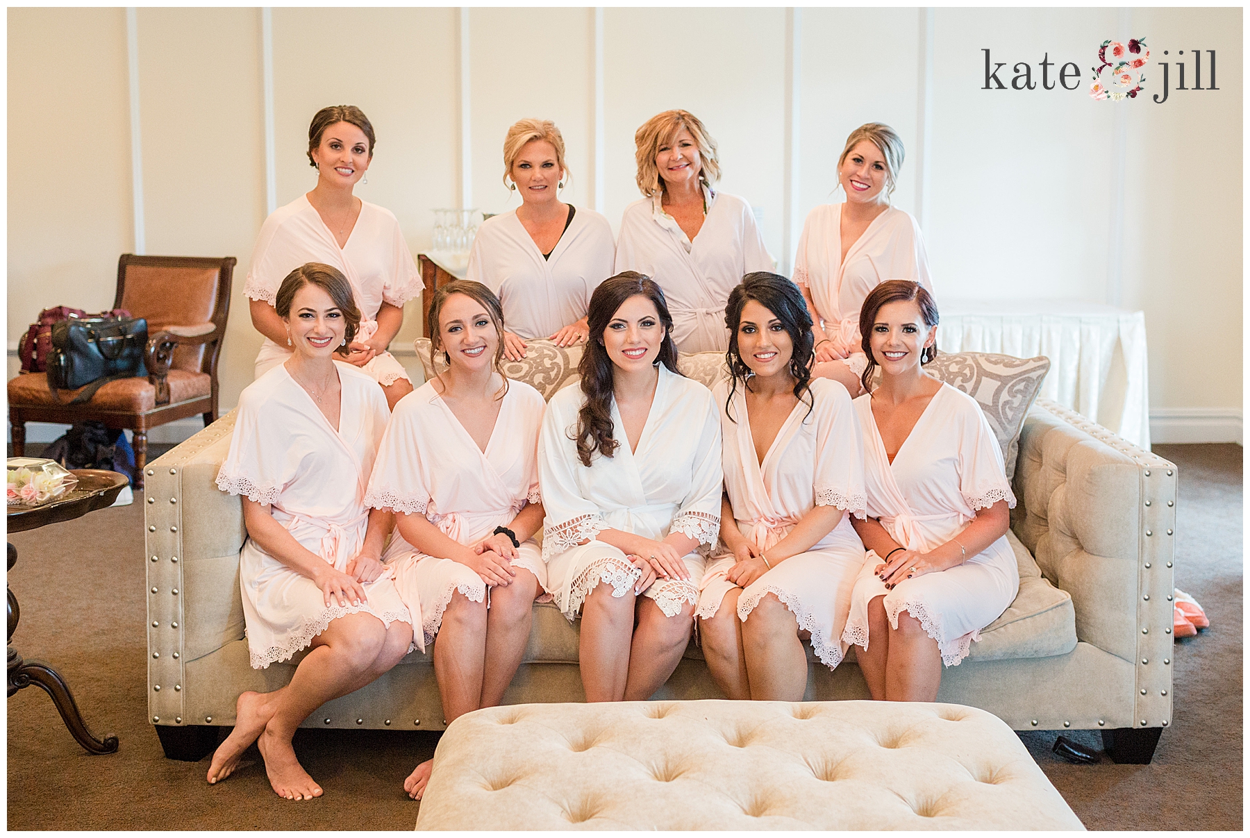 bridesmaids in matching robes The Carriage House