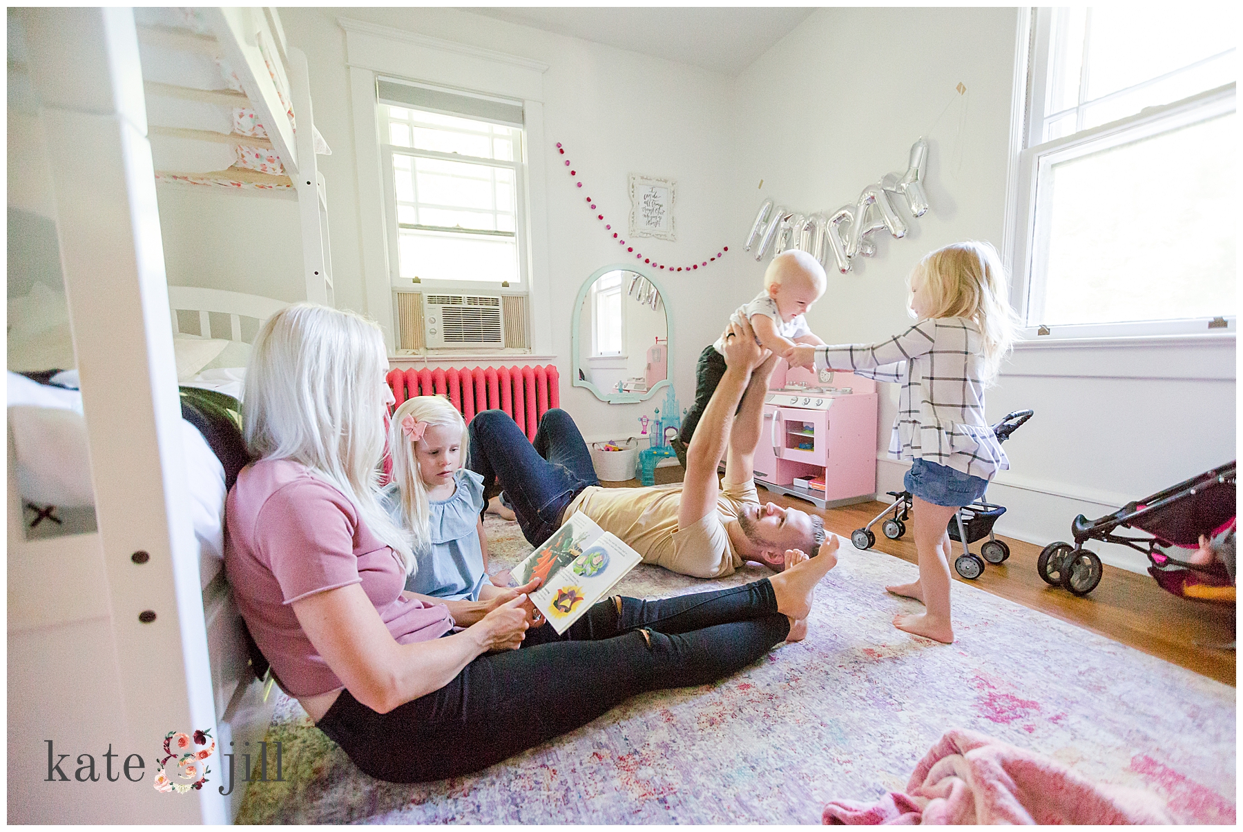 family playing in kids room