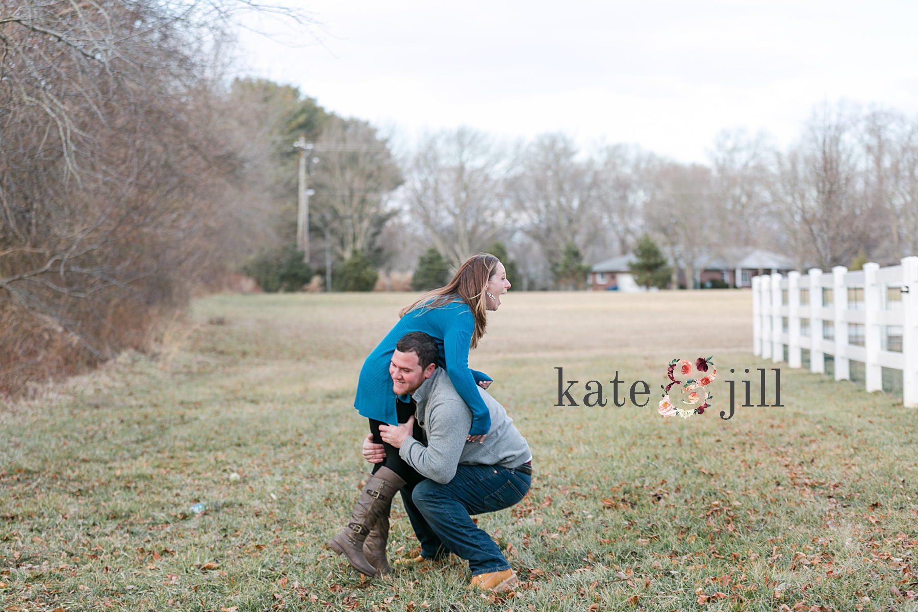 couple goofing off engagement session at home
