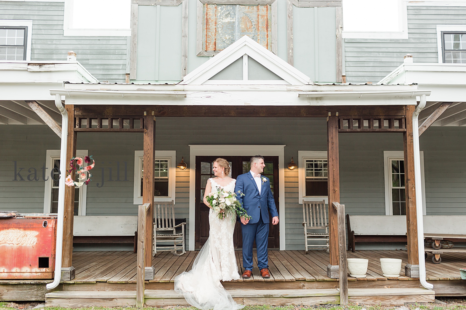 bride and groom on front porch