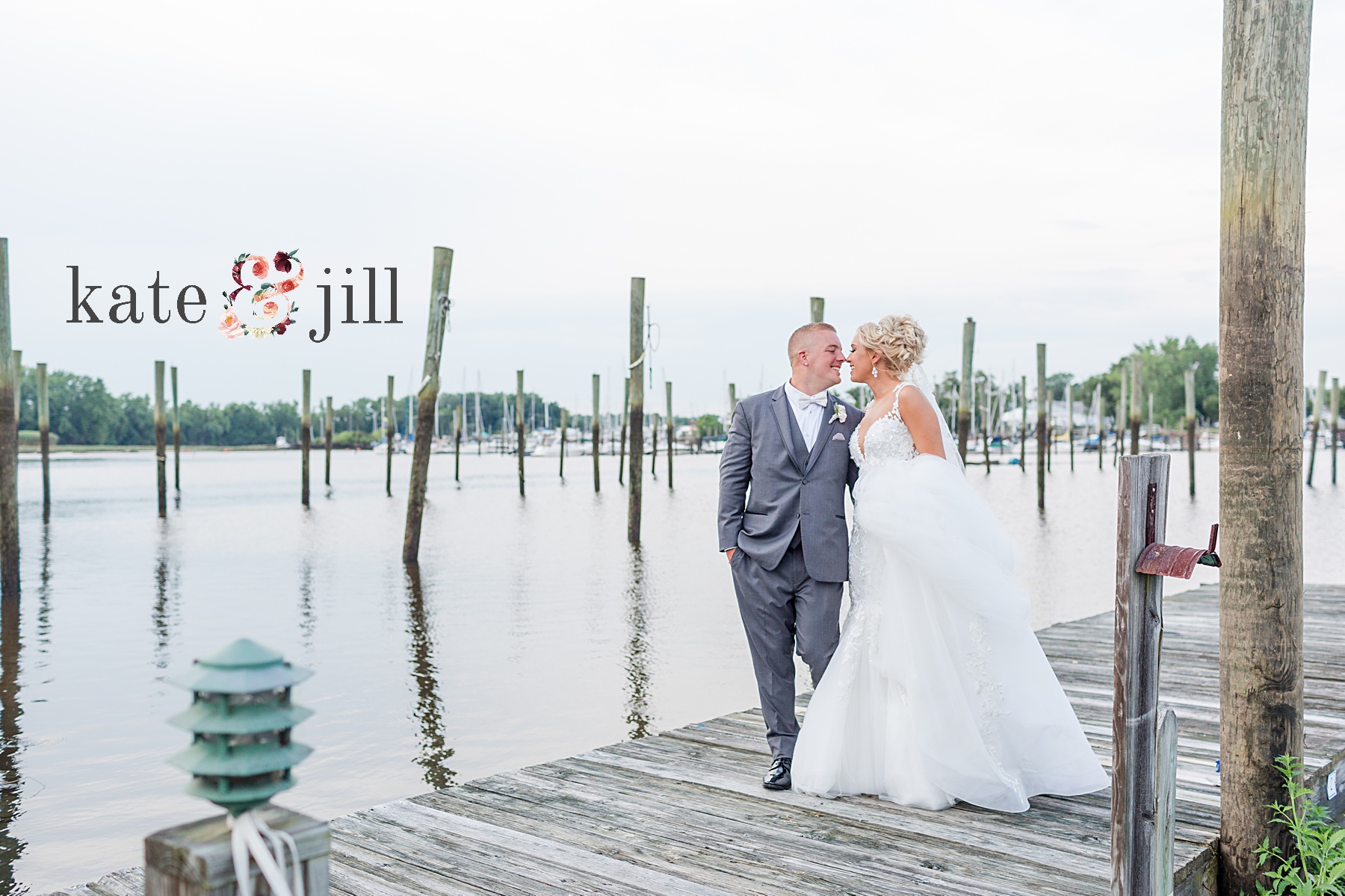 bride and groom walking together on docks