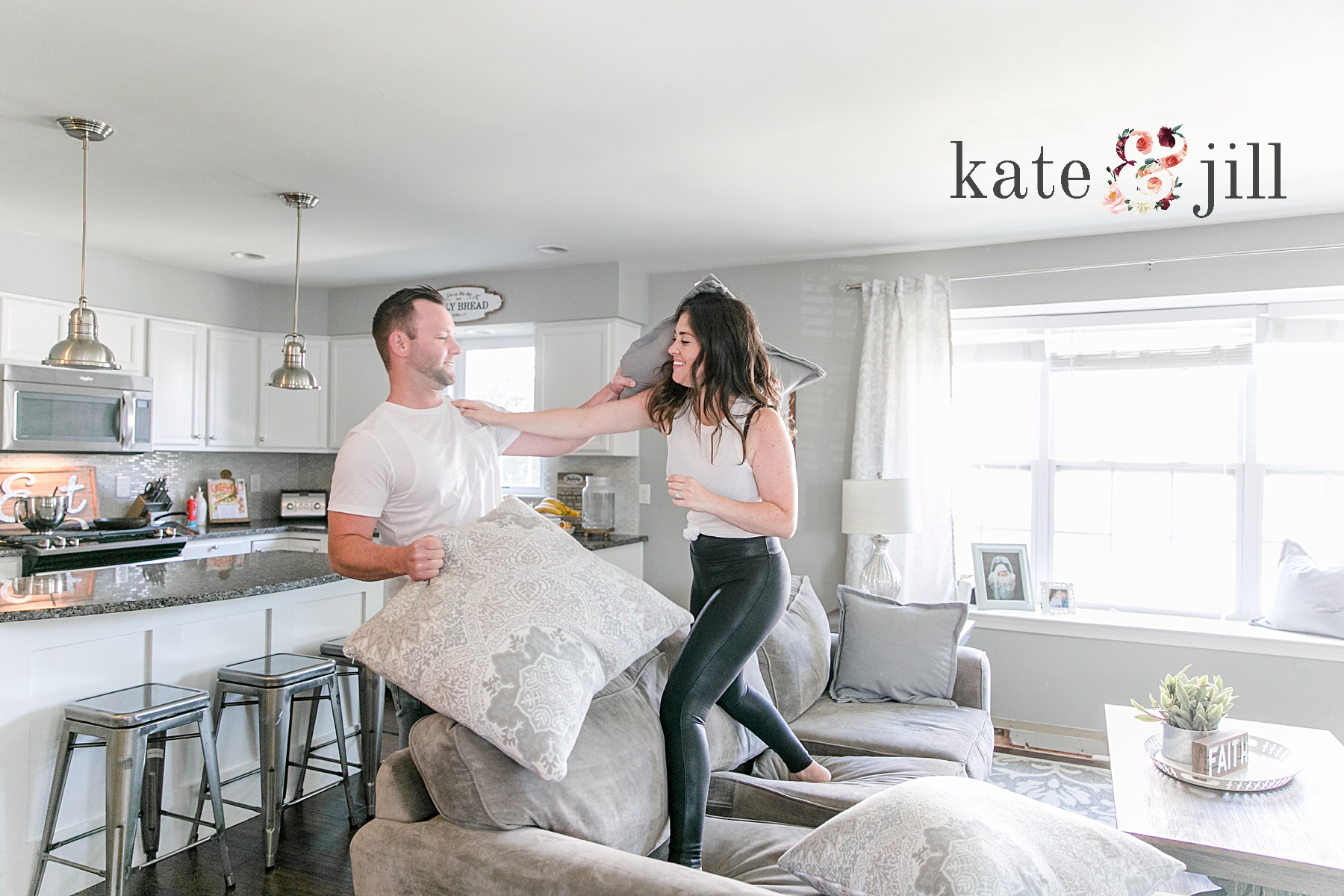 couple having a pillow fight