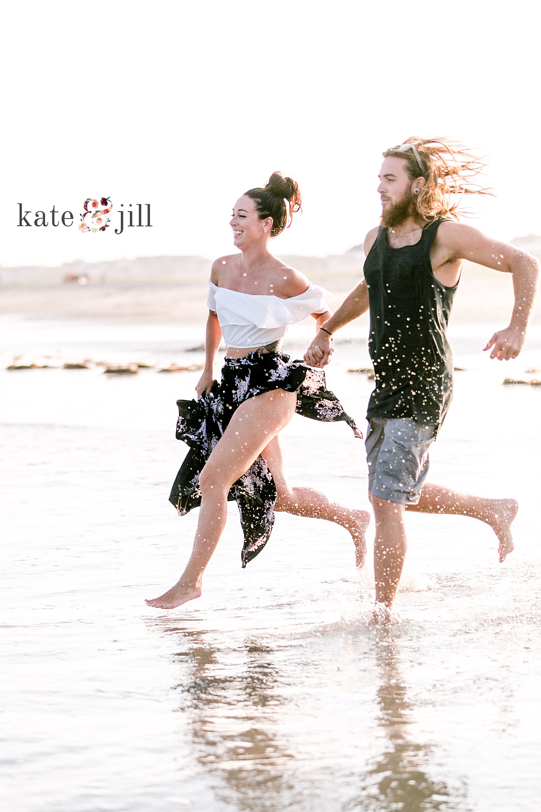 couple running in water