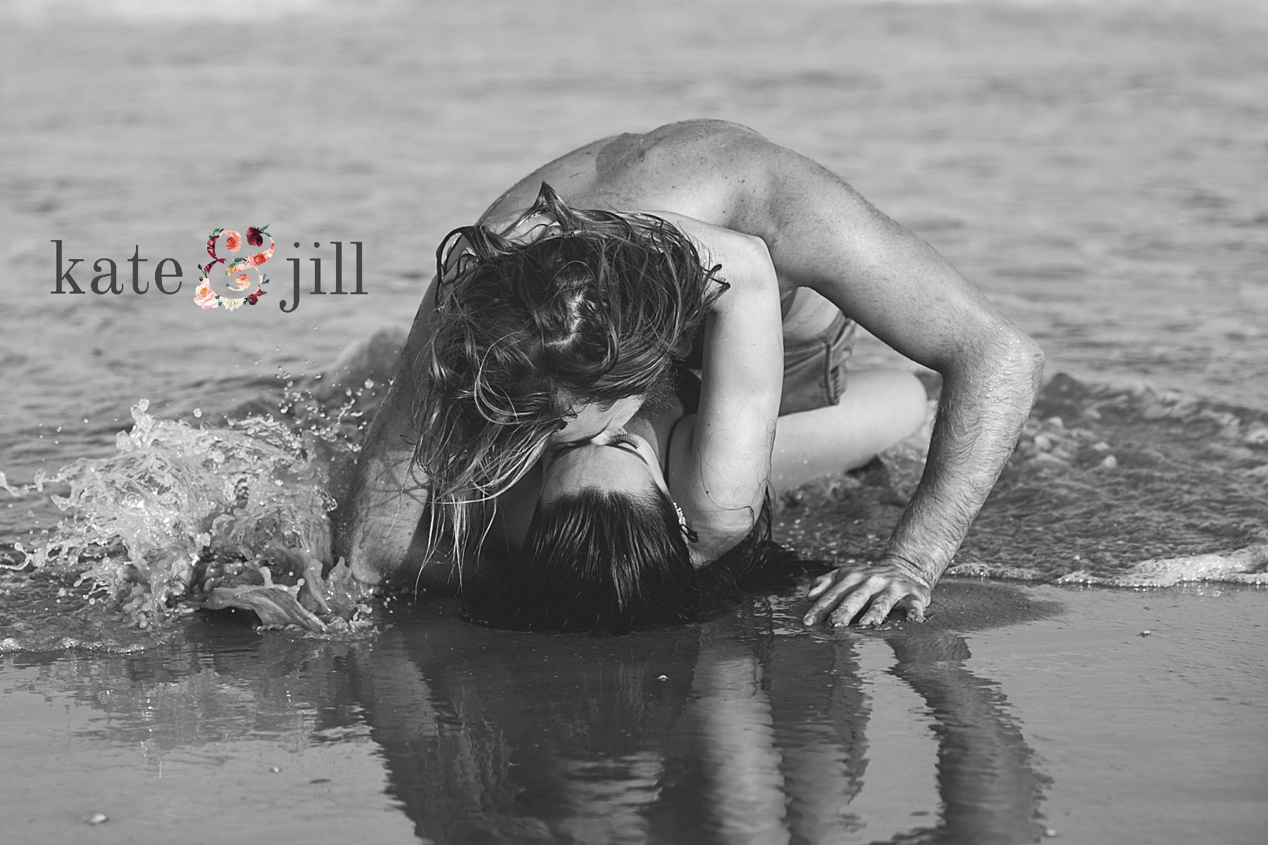 couple laying in water