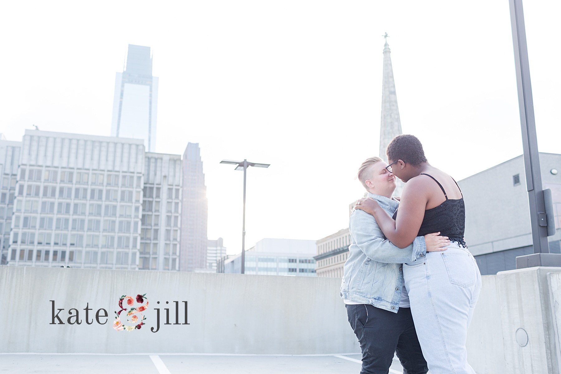 couple kissing on rooftop