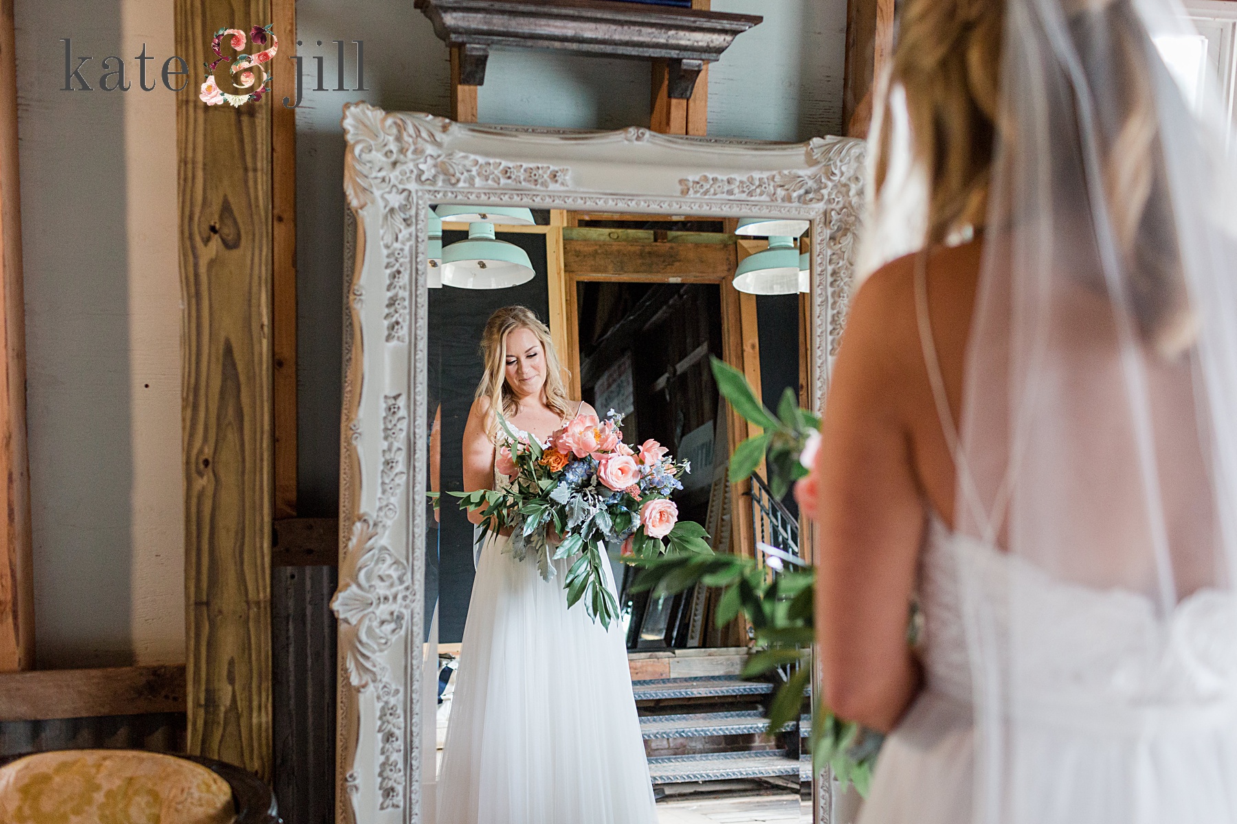 bride looking in mirror getting ready