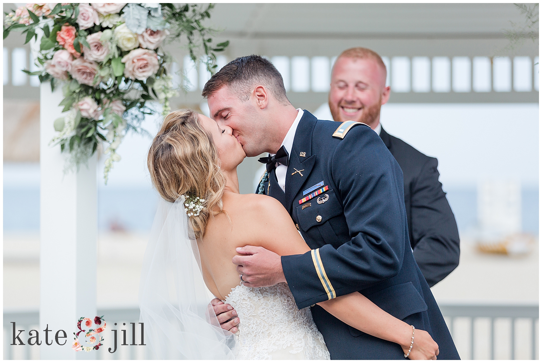 bride and groom kiss at wedding