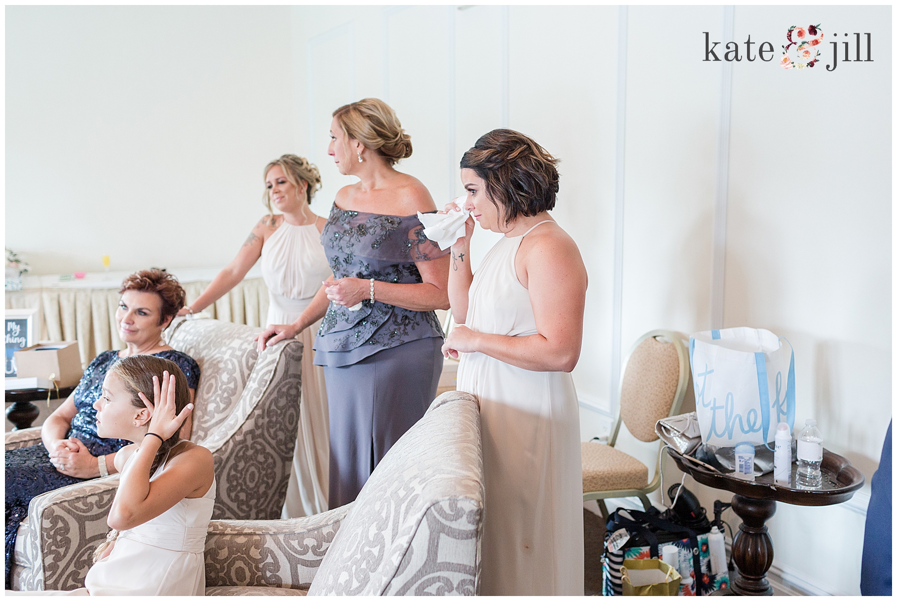 bride getting ready with family 