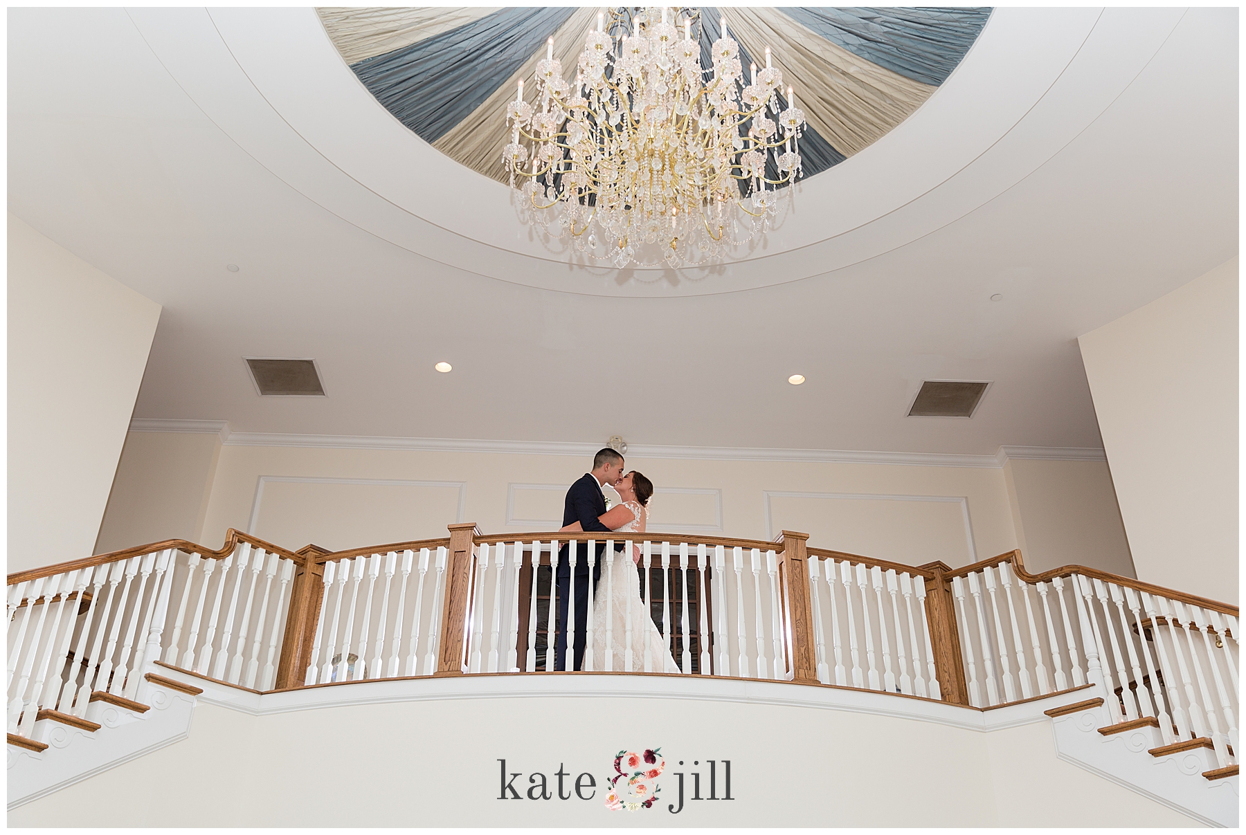 staircase wedding photos bride and groom at Carriage House
