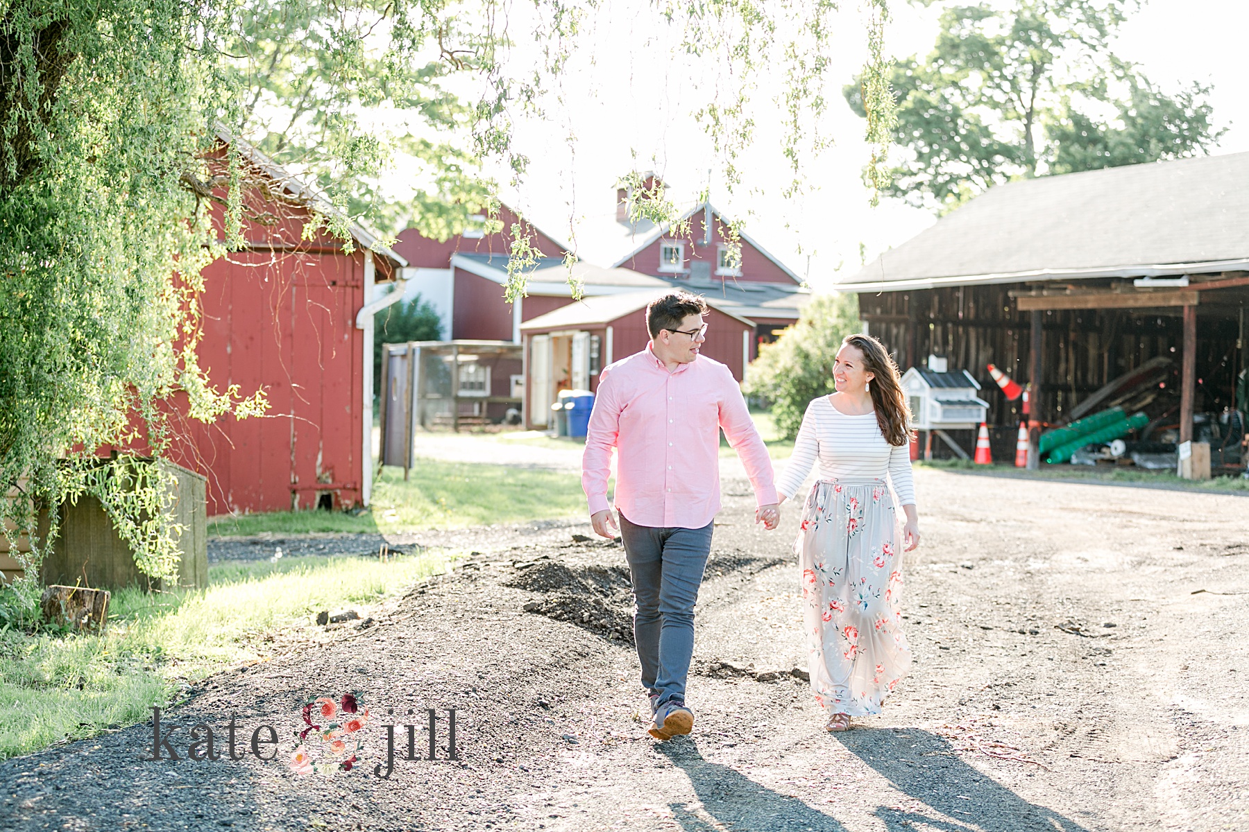 couple walking together hand in hand terhune orchard engagement photos
