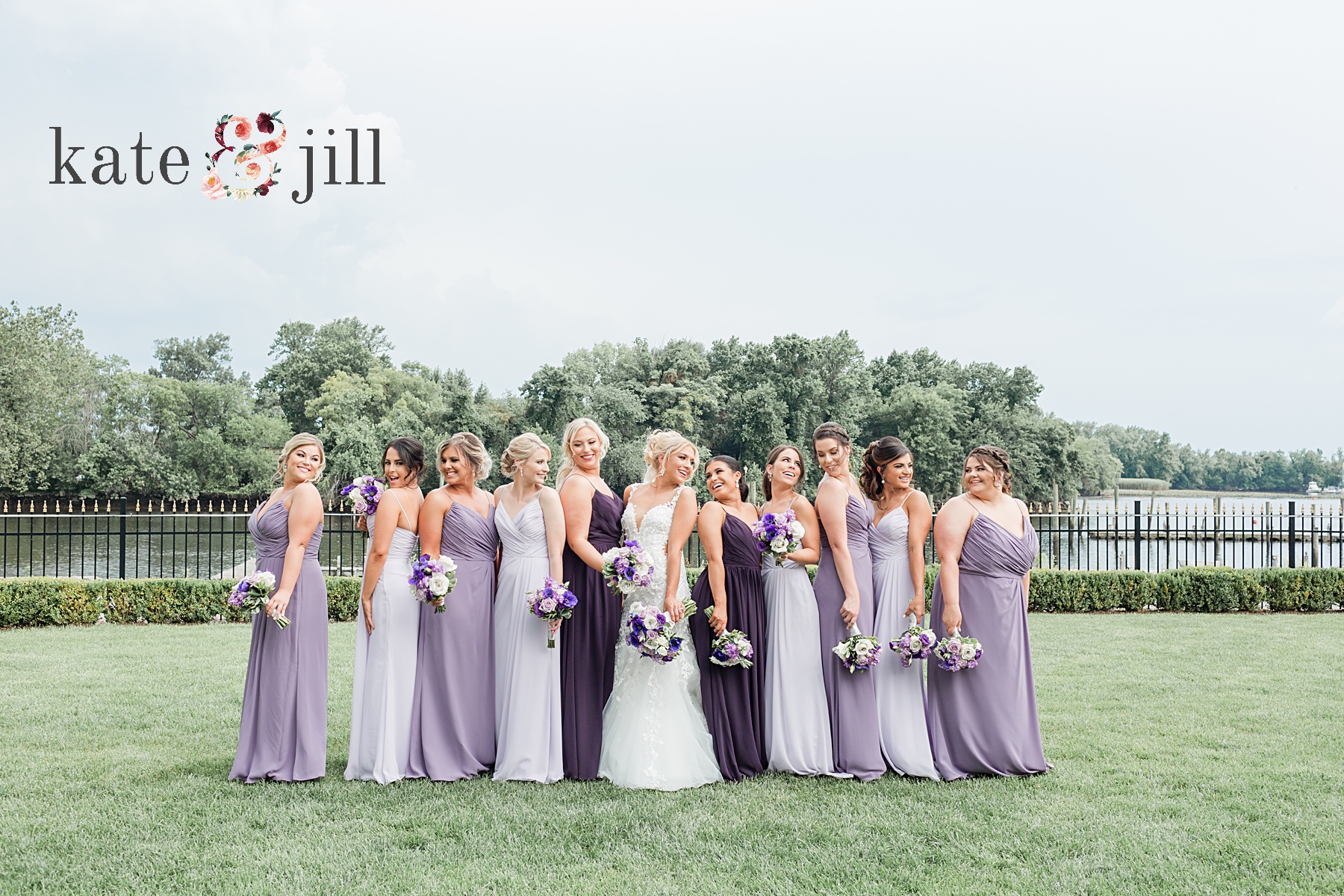 bridesmaids in purple dresses at clarks landing yacht club